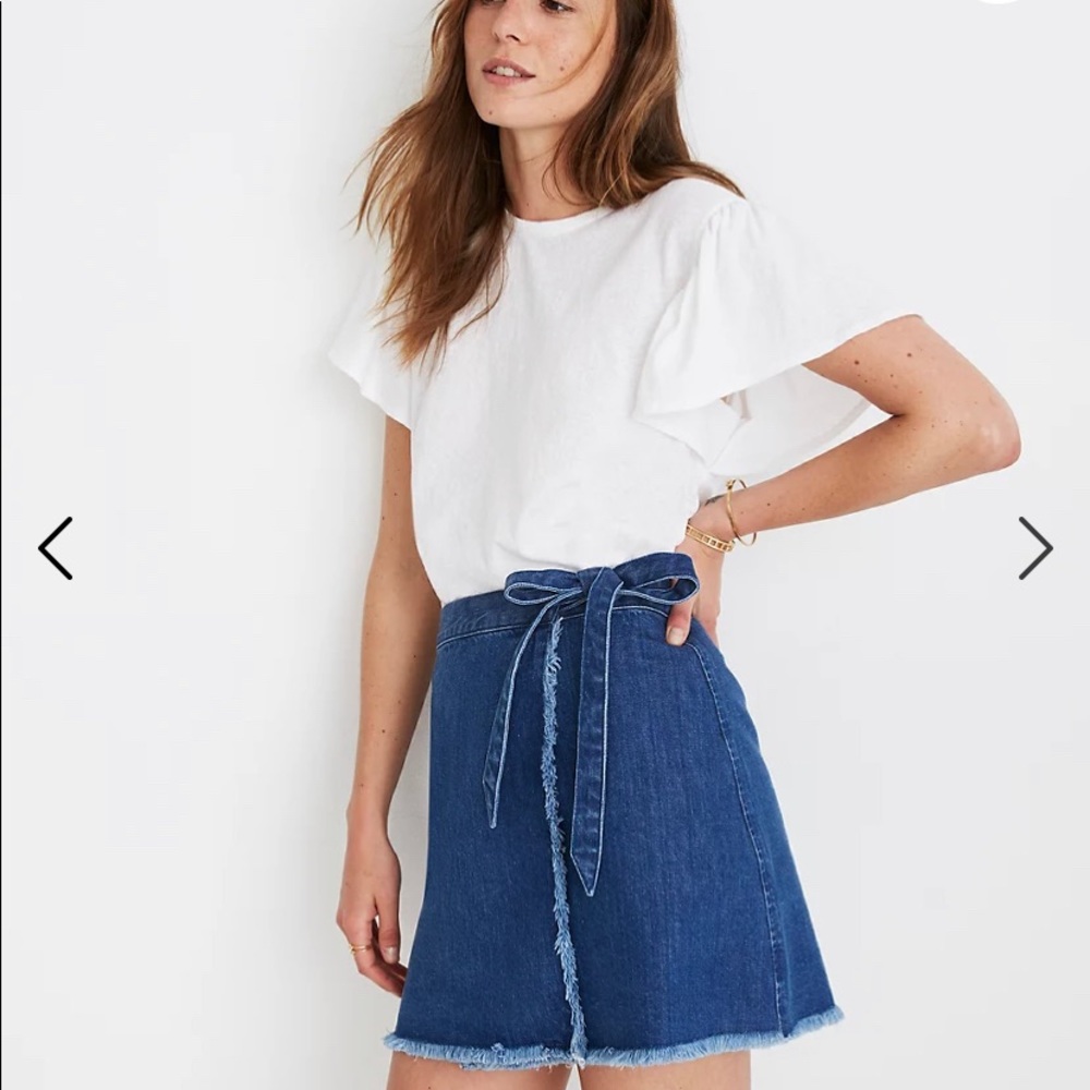 Madewell Raw hem mini wrap skirt.